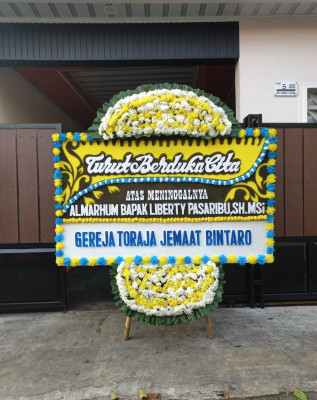 Papan Bunga Duka di Mbulmu Yalma